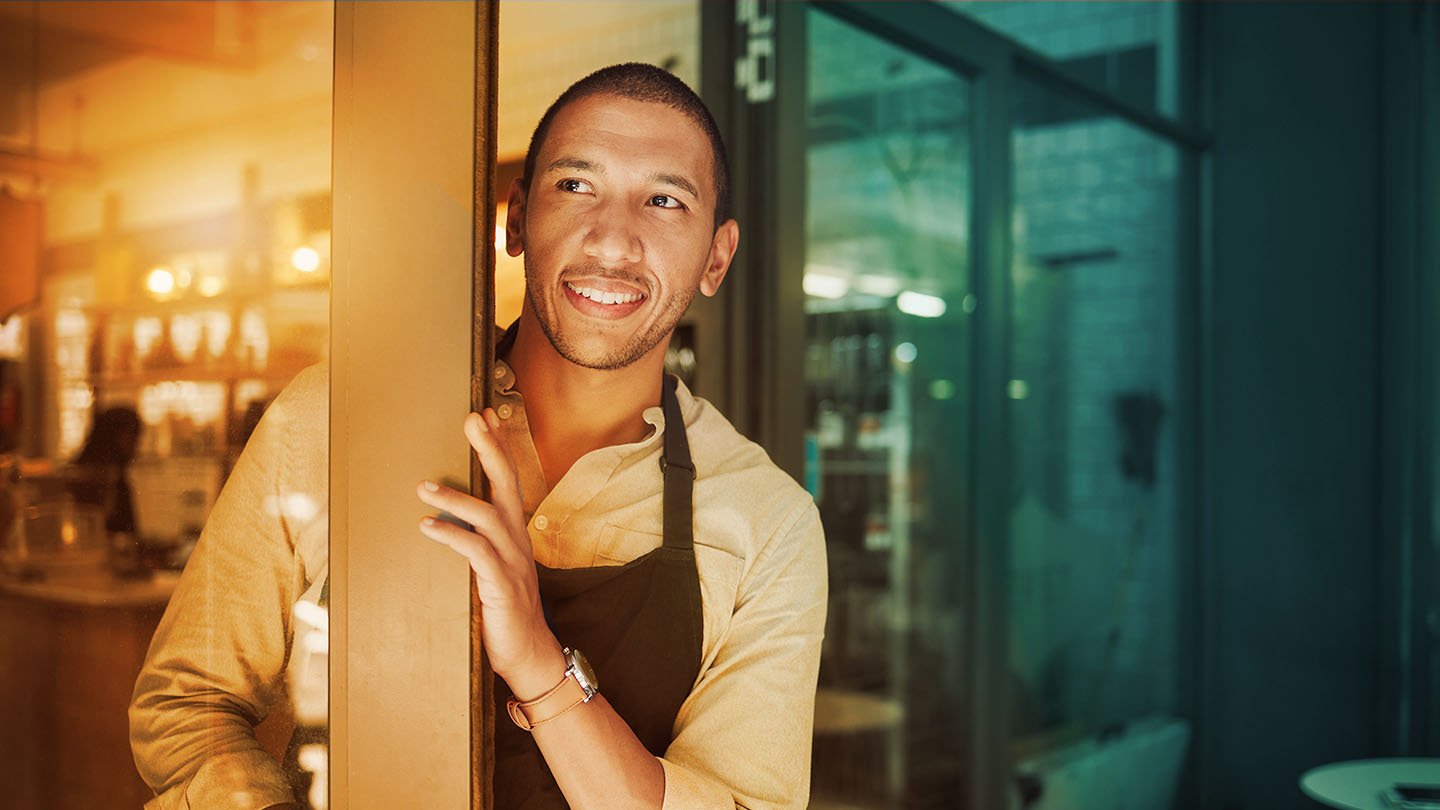 Staff greeting customers at the door