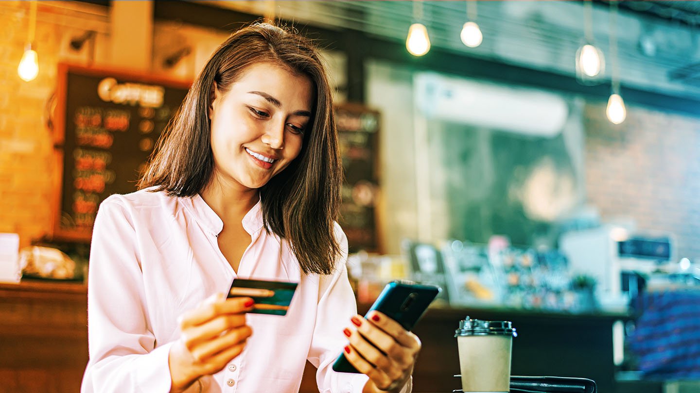 Person doing online banking at a cafe