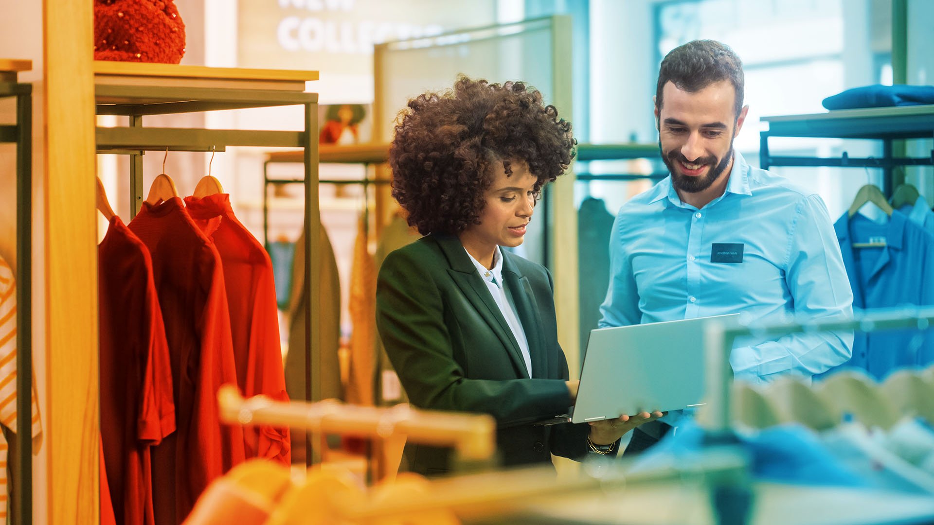 retail staff looking at computer