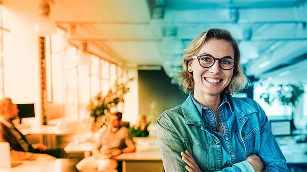 person at forefront of office setting